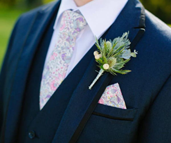 Wedding buttonholes and corsages by John Paul Florist