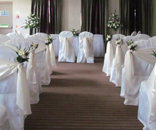 Ceremony flowers for a Derry wedding by John Paul Florist