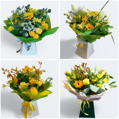 Sunshine Bouquet - A hand-tied gift bouquet in warm sunshine colours.  The bouquet will be created in the florists choice of fresh flowers and seasonal foliages. Bouquet will be aqua-packed in water for extra freshness and delivered in a presentation box or bag.