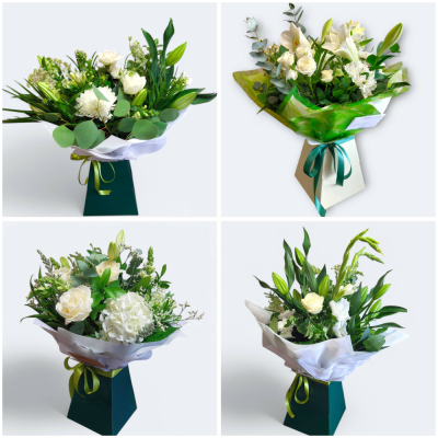 Classic White and Green - A handtied gift bouquet designed in classic whites and greens. Created using the florists choice of the days flowers and foliage. Bouquet will be aqua-packed in water for extra freshness and delivered in a presentation box or bag.
