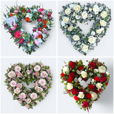 Heart Sympathy Tribute - An open heart-shaped design made with a selection of fresh flowers and foliage sympathetically chosen to express your condolences and thoughts. This lovingly hand-crafted tribute will be delivered with care on your chosen date.